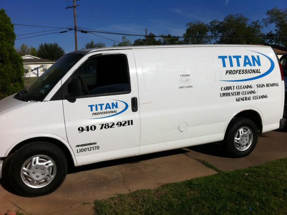 A professional steam cleaning a carpet