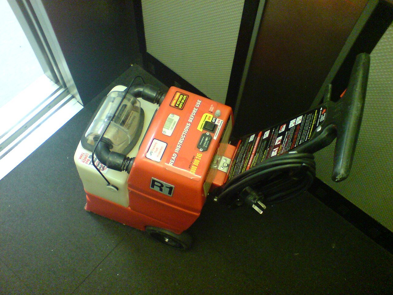 A carpet cleaning machine used for professional hot water extraction